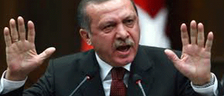 أردوغان قد يحاكم أمام محكمة لاهاي كـ "مجرم حرب"